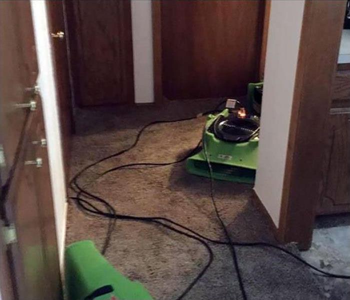 flooding caused water damage to the carpeting