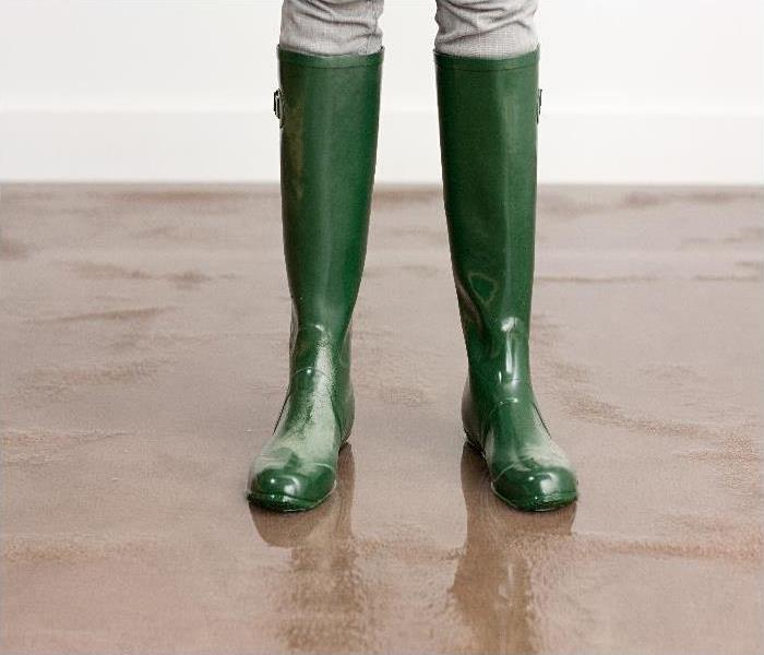  wellington boots on flooded floor