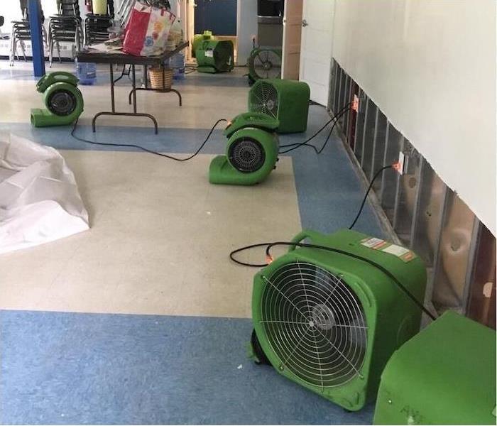 SERVPRO equipment set up in a water damaged cafeteria
